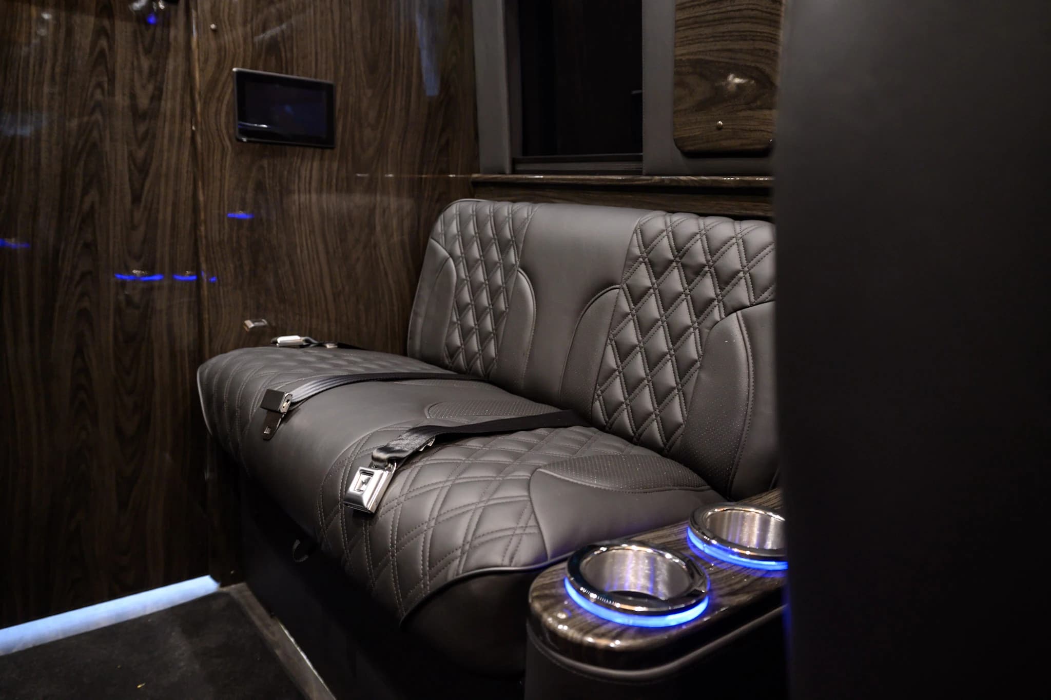 A spacious rear bench adds extra comfort for private Sprinter group travel, Napa tours, and airport transfers.